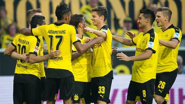 Dortmund goal scorer Henrikh Mkhitaryan celebrates with the team at 4:0 during the German Bundesliga soccer match between Borussia Dortmund and Borussia Moenchengladbach at the Signal Iduna Arena in Dortmund, Germany, 15 August 2015. Photo by: Bernd Thissen/picture-alliance/dpa/AP Images