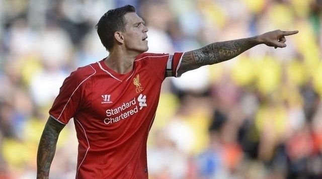 Simon Makienok of Brondby (L) and Daniel Agger of Liverpool walk on the pitch on July 16, 2014 at Broendby stadium during a test match between Brondby and Liverpool. Broendby won 2-1. AFP Photo / / Scanpix DENMARK / Liselotte Sabroe / DENMARK OUT        (Photo credit should read LISELOTTE SABROE/AFP/Getty Images)